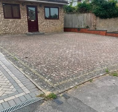 A block-paved driveway cleaned outside a Braintree home