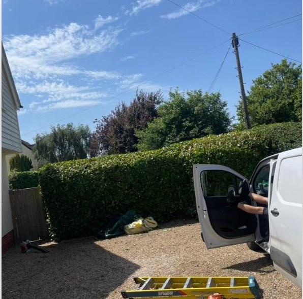 The Williams Landscaping van on site for a hedge trimming job in Braintree