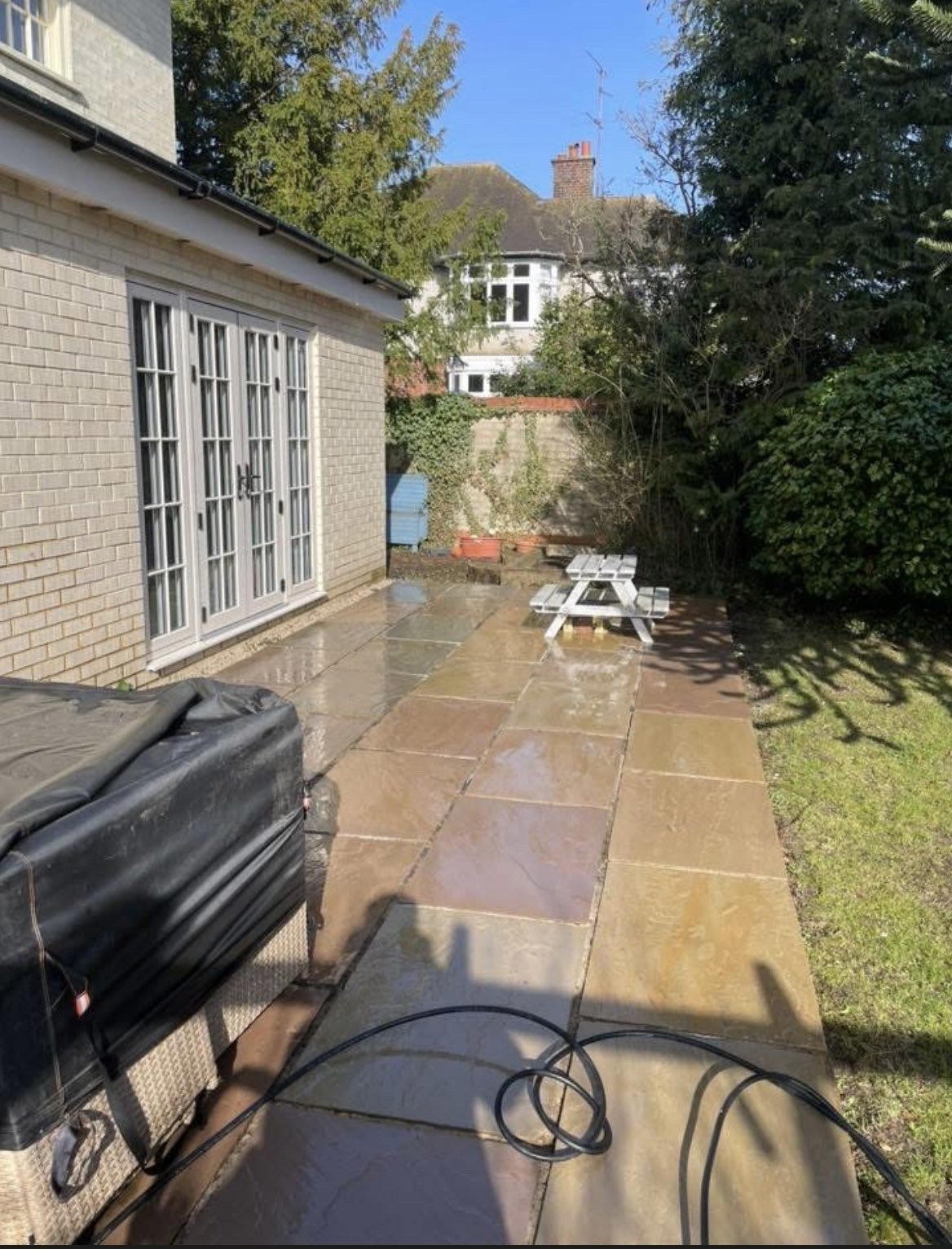 A clean, freshly jet washed patio in Braintree